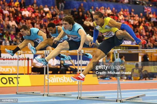 Pascal Martinot-Lagarde of France on his way tovictory from Sergey Shubenkov of Russia in the men's 60 metres final during the Sainsbury's Indoor...