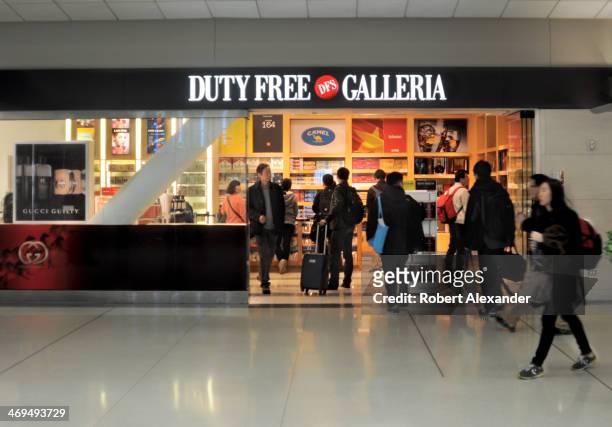 Airline passengers browse in the DFS Duty Free Galleria at San Francisco International Airport in San Francisco, California.