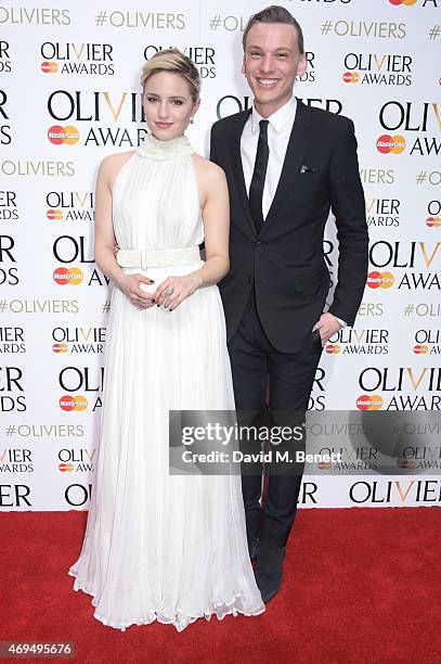 Presenters Dianna Agron and Jamie Campbell Bower pose in the winners room at The Olivier Awards at The Royal Opera House on April 12, 2015 in London,...