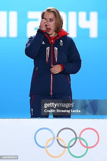 Gold medalist Lizzy Yarnold of Great Britain cries on the podium during the medal ceremony for the Women's Skelton on day 8 of the Sochi 2014 Winter...