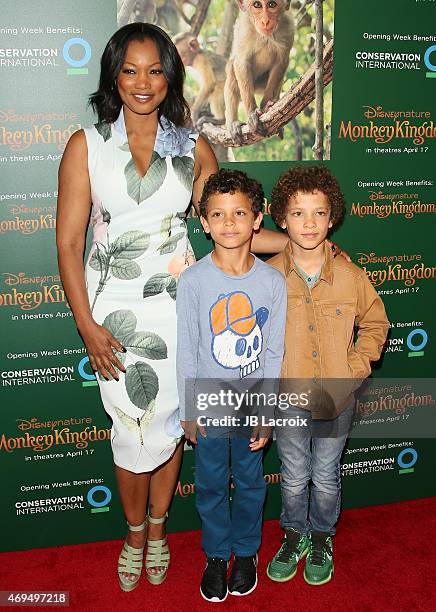 Garcelle Beauvais and sons Jaid Thomas Nilon and Jax Joseph Nilon attend the world premiere Of Disney's 'Monkey Kingdom' at Pacific Theatres at The...