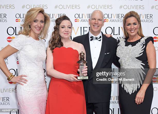 Kate Pakenham, Josie Rourke and David Zippel, winners of the Best Musical Revival for "City Of Angels", and presenter Claire Sweeney pose in the...