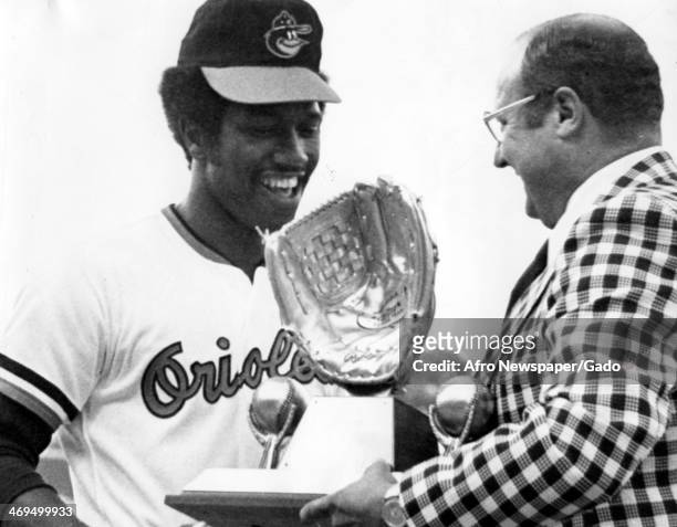 Paul Blair, baseball player for the Baltimore Orioles, receives an award from Rawlings Co for being the best player in his league, Baltimore,...