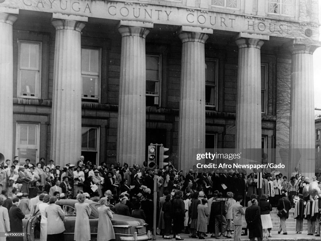 Crowd Outside A Court House