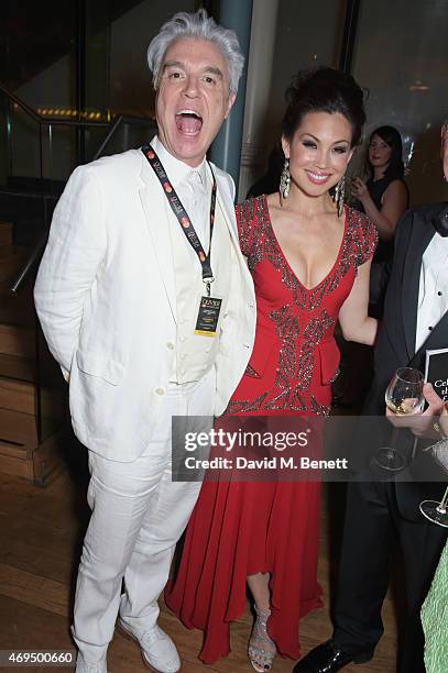 David Byrne and Natalie Mendoza attend The Olivier Awards after party at The Royal Opera House on April 12, 2015 in London, England.