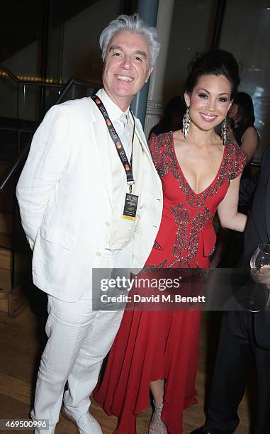 David Byrne and Natalie Mendoza attend The Olivier Awards after party at The Royal Opera House on April 12, 2015 in London, England.