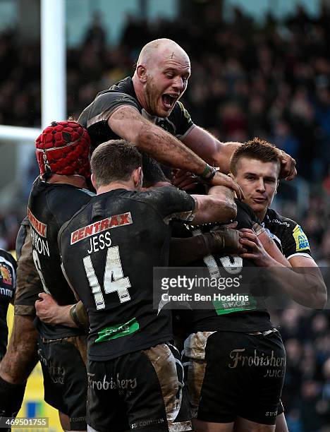 Ian Whitten of Exeter celebrates with team mates after scoring a try during the Aviva Premiership match between Exeter Chiefs and Bath at Sandy Park...