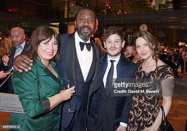 Lisa Makin, Lenny Henry, Iwan Rheon and Zoe Grisedale attend The Olivier Awards after party at The Royal Opera House on April 12, 2015 in London,...