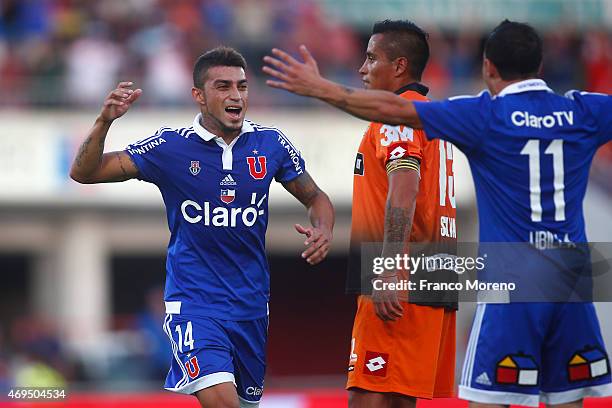 Paulo Magalhaes of Universidad de Chile celebrates with his teammate Sebastian Ubilla after scoring the second goal of his team during a match...