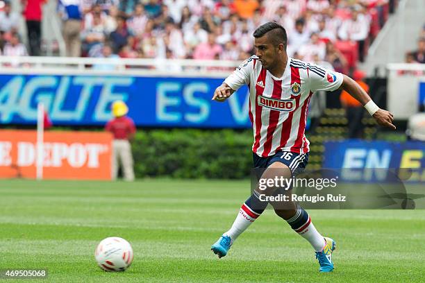 Miguel Ponce of Chivas drives the ball during a match between Chivas and Leon as part of 13th round of Clausura 2015 Liga MX at Omnilife Stadium on...