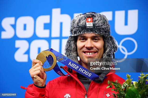 Gold medalist Sandro Viletta of Switzerland poses with his medal during the medal ceremony for the Alpine Skiing Men's Super Combined on day 8 of the...