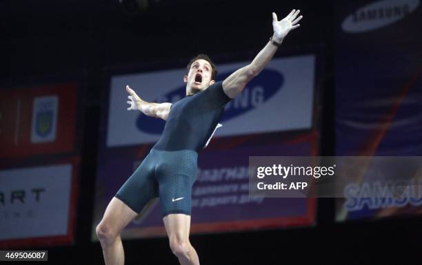 France's Renaud Lavillenie reacts just after breaking Sergei Bubka's 21-year-old indoor pole vault world record on February 15 in Donetsk, at the...