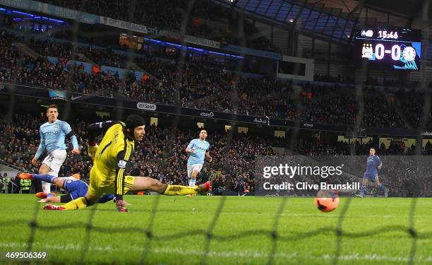 Steven Jovetic of Manchester City scores the first goal past Petr Cech of Chelsea during the FA Cup Fifth Round match sponsored by Budweiser between...