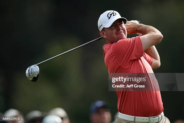 Robert Garrigus hits a tee shot on the 2nd hole in the third round of the Northern Trust Open at the Riviera Country Club on February 15, 2014 in...