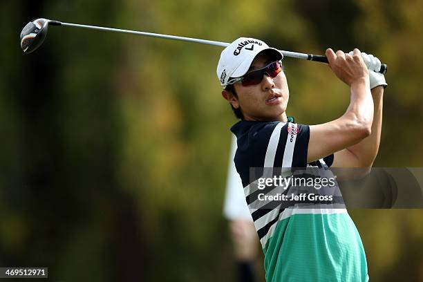 Sang-Moon Bae of Korea hits a tee shot on the 2nd hole in the third round of the Northern Trust Open at the Riviera Country Club on February 15, 2014...