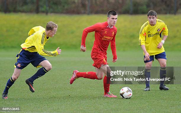 Rees Greenwood of Sunderland chases Alex O'Hanlon of Liverpool as Sunderland's Lynden Gooch looks on during the Barclays Premier League Under 18...