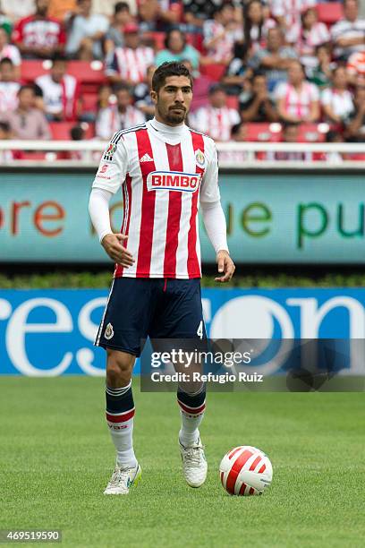 Jair Pereira of Chivas drives the ball during a match between Chivas and Leon as part of 13th round of Clausura 2015 Liga MX at Omnilife Stadium on...