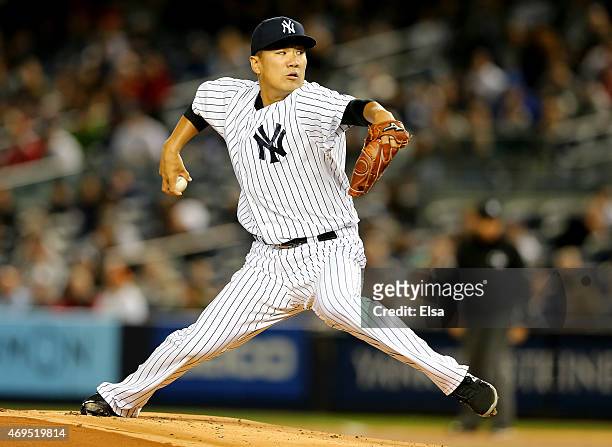 Masahiro Tanaka of the New York Yankees delivers a pitch in the first inning against the Boston Red Sox on April 12, 2015 at Yankee Stadium in the...