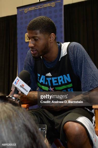 Paul George of the Eastern Conference All-Stars speaks with the media at NBA All-Star Practice at Sprint Arena as part of 2014 NBA All-Star Weekend...