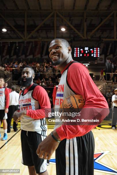 Kevin Durant of the Western Conference All-Stars smiles during NBA All-Star Practice at Sprint Arena as part of 2014 NBA All-Star Weekend at the...