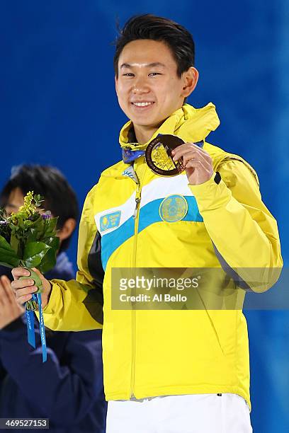 Bronze medalist Denis Ten of Kazakhstan celebrates during the medal ceremony for the Men's Figure Skating on day 8 of the Sochi 2014 Winter Olympics...