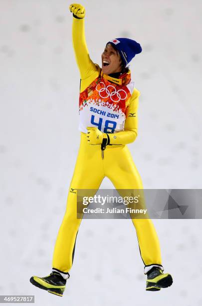 Silver medalist Noriaki Kasai of Japan celebrates on the podium during the flower ceremony after the Men's Large Hill Individual Final Round on day 8...