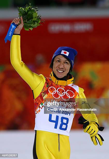 Silver medalist Noriaki Kasai of Japan celebrates after the flower ceremony after the Men's Large Hill Individual Final Round on day 8 of the Sochi...