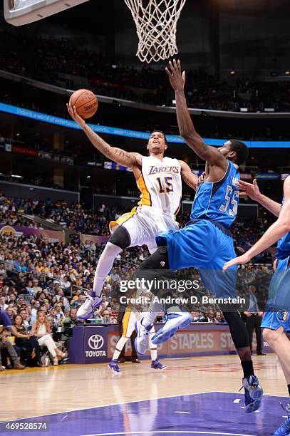 Jabari Brown of the Los Angeles Lakers goes to the basket against Bernard James of the Dallas Mavericks on April 12, 2015 at Staples Center in Los...