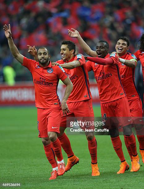 Lucas Moura, Marquinhos, Blaise Matuidi and Thiago Silva of PSG celebrate the victory after the French League Cup final between Paris Saint-Germain...