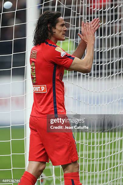 Edinson Cavani of PSG celebrates the victory after the French League Cup final between Paris Saint-Germain FC and Sporting Club de Bastia at Stade de...