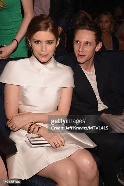 Actors Kate Mara and Jamie Bell attend The 2015 MTV Movie Awards at Nokia Theatre L.A. Live on April 12, 2015 in Los Angeles, California.