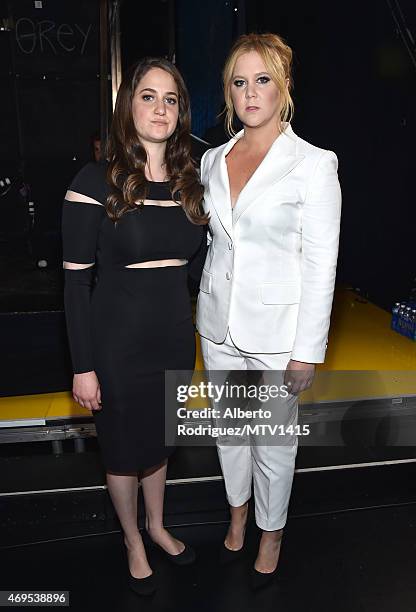 Producer Kim Caramele and host Amy Schumer attend The 2015 MTV Movie Awards at Nokia Theatre L.A. Live on April 12, 2015 in Los Angeles, California.