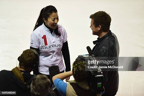 Laureus World Sports Academy member Yang Yang speaks to the media during a visit to a Laureus Sport For Good Project prior to the Laureus World...