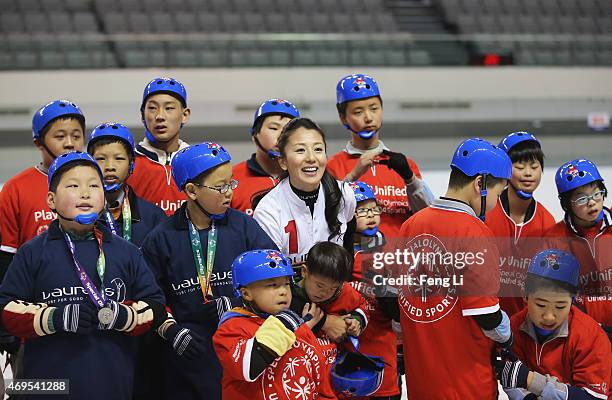 Laureus World Sports Academy member Yang Yang of China visits a Laureus Sport For Good Project prior to the Laureus World Sports Awards 2015 at the...