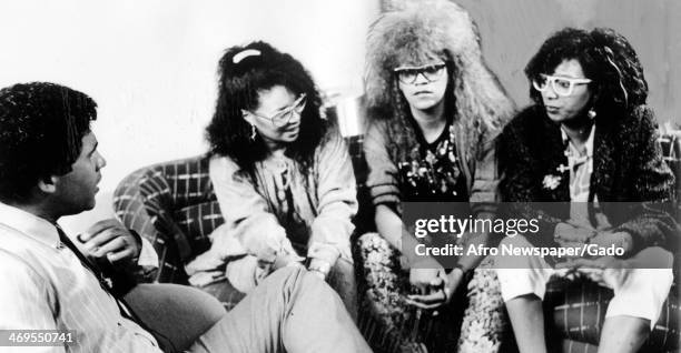 Portrait of the singers The Pointer Sisters in an interview with Ebony Jet Showcase host Greg Gumbel, 1985.