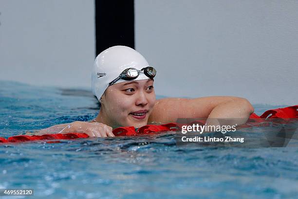 Tang Yi of China looks on after competes in the Women's 100 meters freestyle preliminaries on day five of the China National Swimming Championships...