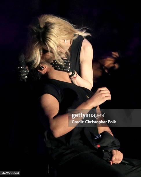 Recording artists Madonna and Drake kiss onstage during day 3 of the 2015 Coachella Valley Music & Arts Festival at the Empire Polo Club on April 12,...