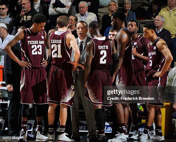 Head coach Billy Kennedy of Texas A&M coaches his team during a game against the Vanderbilt Commodores at Memorial Gym on February 15, 2014 in...