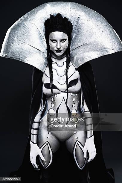 fashion woman painted in black and silver body art - gray alien stock pictures, royalty-free photos & images