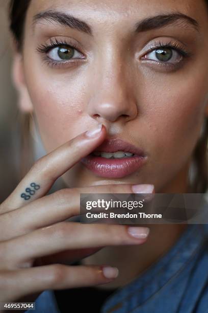 Model poses backstage ahead of the AJE show at Mercedes-Benz Fashion Week Australia 2015 at Carriageworks on April 13, 2015 in Sydney, Australia.