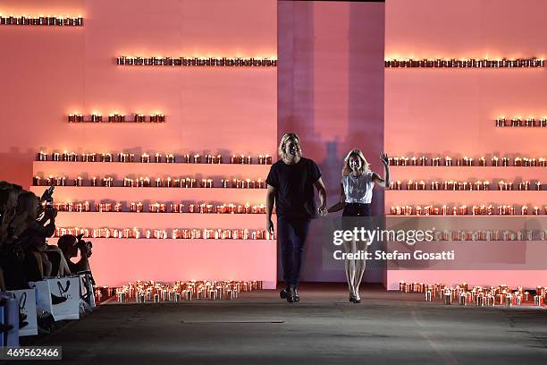 Designers Adrian Norris and Edwina Robinson thank guests on the catwalk at the AJE show at Mercedes-Benz Fashion Week Australia 2015 at Carriageworks...