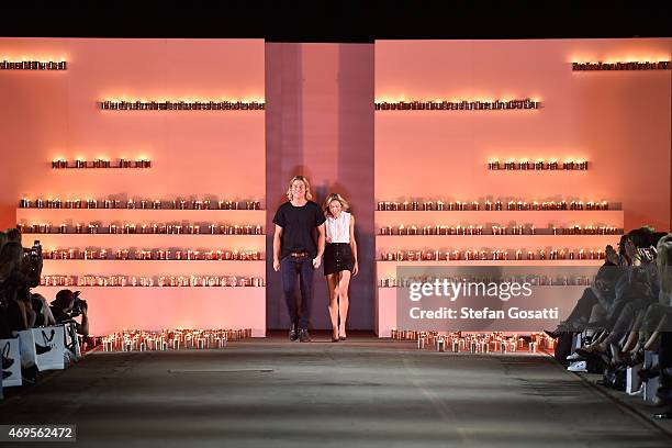 Designers Adrian Norris and Edwina Robinson thank guests on the catwalk at the AJE show at Mercedes-Benz Fashion Week Australia 2015 at Carriageworks...