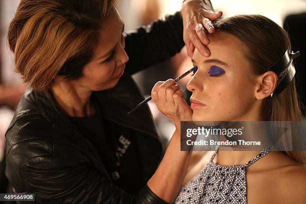 Model prepares backstage ahead of the Gary Bigeni show at Mercedes-Benz Fashion Week Australia 2015 at Carriageworks on April 13, 2015 in Sydney,...