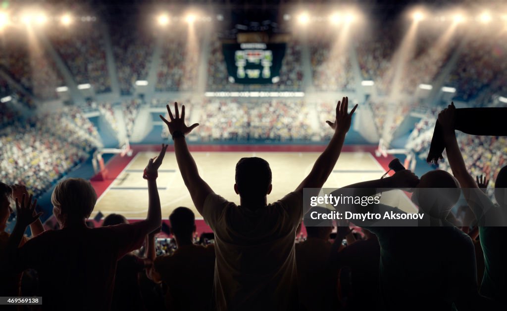 Basketball fans at basketball arena