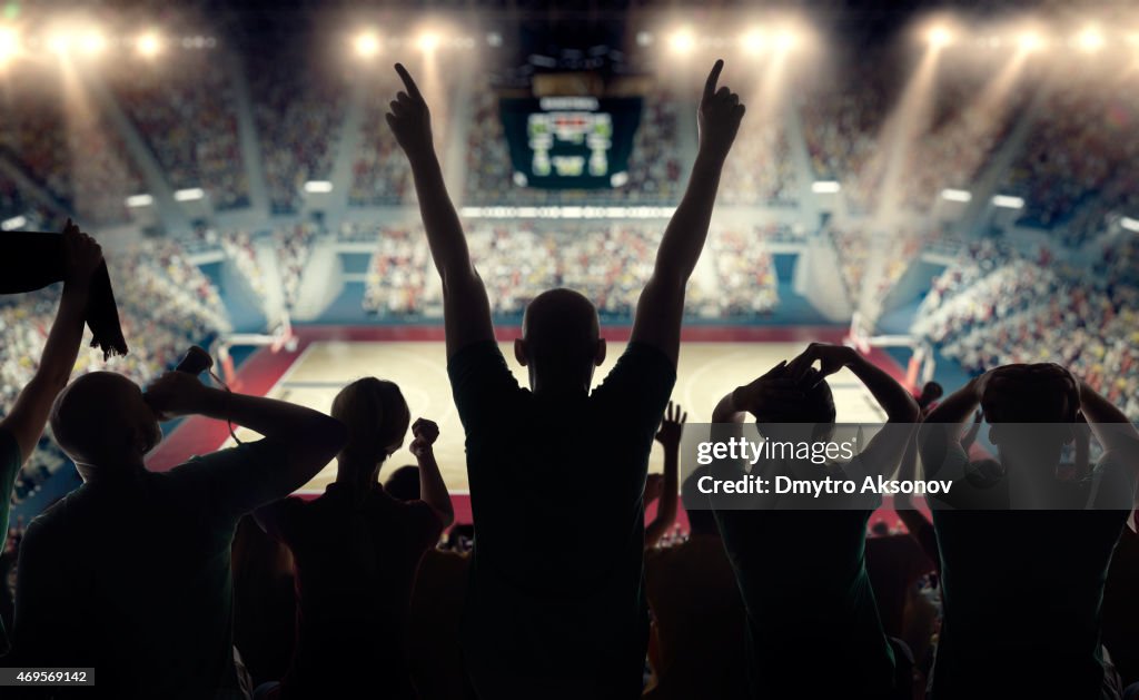 Basketball fans at basketball arena