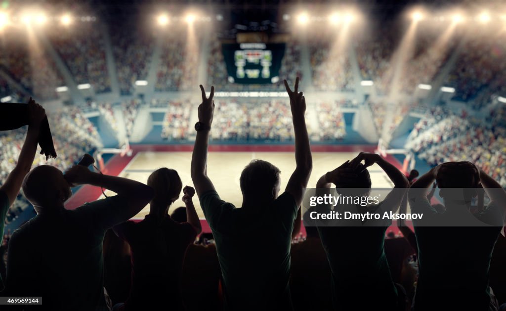 Basketball fans at basketball arena