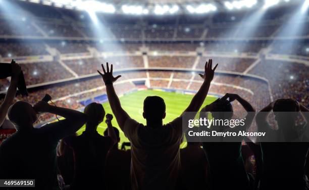 soccer fans at stadium - audience football stockfoto's en -beelden