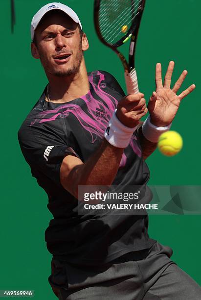 Austria's Andreas Haider-Maurer hits a return to Latvia's Ernests Gulbis during a Monte-Carlo ATP Masters Series Tournament tennis match on April 13,...
