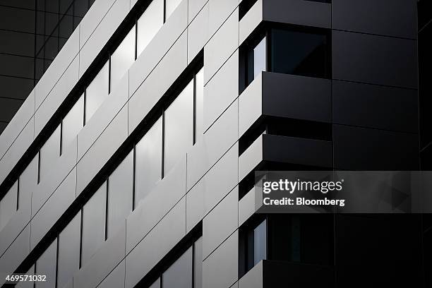 Newly installed windows sit in a new office complex, No. 5 Broadgate, to be occupied by UBS AG, as construction work nears completion in London,...