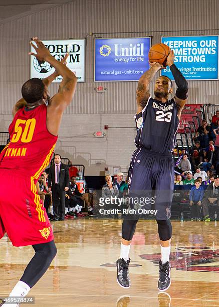 Romero Osby of the Maine Red Claws puts up a jump shot over Travis Hyman of the Fort Wayne Mad Ants during Playoff Game on April 11, 2015 at the...